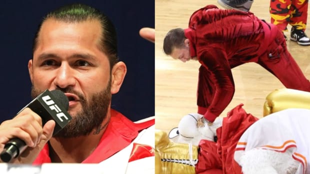 Former UFC title contender Jorge Masvidal and Conor McGregor, who is seen punching a mascot for the NBA team the Miami Heat.